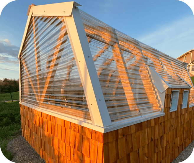 A wooden structure with a glass roof.